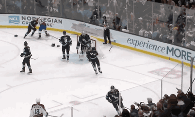 Gotta See It: Nathan MacKinnon Drops the Gloves With Barrett Hayton